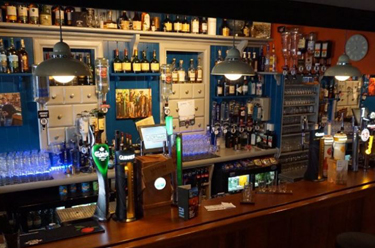 Back Bar Shelves at Paul Geaney's Bar & Restaurant Dingle Wild Atlantic Way Thumbnail