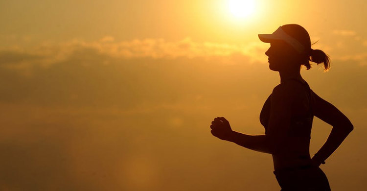Woman Running in the Sunset.